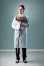 Scientist humorously portrays sloppy methods with mallet Royalty Free Stock Photo