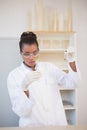 Scientist looking at sprouts in test tube Royalty Free Stock Photo