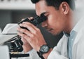 Scientist, man and microscope for science research, data analysis and DNA investigation with laboratory technology Royalty Free Stock Photo