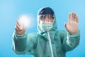 Scientist, Microbiologist or Doctor in full protected suit with disinfectant , Coronavirus Quarantine. Disinfection and