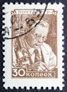 scientist microscope and man wearing glasses in vintage stamp