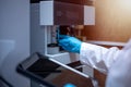 Scientist performs maintenance checks of the analytical instrument, Liquid Chromatography Mass Spectrometer LC MS