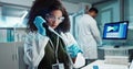 Scientist, pipette and woman with beaker for chemistry, research or experiment at laboratory. Science, glass and serious Royalty Free Stock Photo