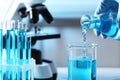 Scientist pouring light blue liquid from flask into beaker near test tubes in laboratory, closeup Royalty Free Stock Photo