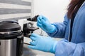 Scientist preparing slides with tissue samples for immunohistochemistry assay in the laboratory. Scientist at the Royalty Free Stock Photo