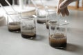 Scientist preparing soil extract at table. Laboratory analysis