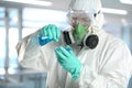 Scientist in protective clothing working Royalty Free Stock Photo