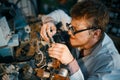 Scientist prototyping electrical device in lab