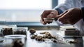 A scientist's hands carefully crushing and sifting a dry soil sample for lab analysis Royalty Free Stock Photo