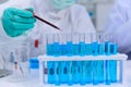 Scientist team has researching and working on Coronavirus cure in the laboratory. Asian Doctor examining samples Royalty Free Stock Photo
