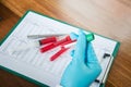 Scientist with test tube making research in clinical laboratory. Royalty Free Stock Photo