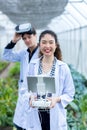 Scientist use remote controller piloting drone at vegetable garden Lab