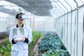 Scientist use remote controller piloting drone at vegetable garden Lab