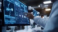 Scientist Using Advanced Technology on Computer Screen in a Lab Royalty Free Stock Photo