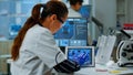 Scientist using digital tablet working in modern medical research laboratory Royalty Free Stock Photo