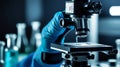 Scientist using a microscope in a laboratory setting Royalty Free Stock Photo