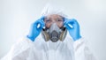 Scientist wearing biohazard chemical protective suit