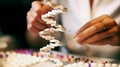 Scientist working on a DNA double helix model in a laboratory