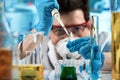 Scientist working with pipette and pcr tube in chemical lab Royalty Free Stock Photo