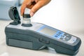 Scientist working at water quality test use by Spectrophotometer