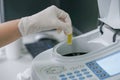 Scientist working at water quality test use by Spectrophotometer