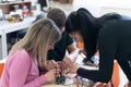Scientists engineers designing small human robot, setting artificial intelligence humanoid robot. Artificial intelligence,