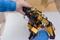 Scientists engineers designing small human robot, setting artificial intelligence humanoid robot. Artificial intelligence,
