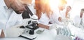 Scientists examining in the lab with test tubes.