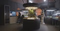 Scientists and robot working with plant incubators