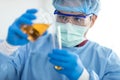 Scientists wear protective clothing while doing medical research in a science lab Royalty Free Stock Photo