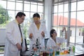 Scientists working in laboratory