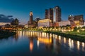 The Scioto River and Columbus skyline at night, in Columbus, Ohio