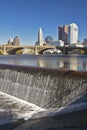Scioto River with waterfall and Columbus Ohio skyline, with setting sunlight Royalty Free Stock Photo