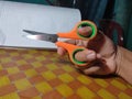 A scissor can used to cut paper to be some piece