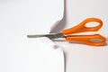 Scissor cutting white paper Royalty Free Stock Photo