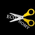 Scissor Cutting the word Economy.