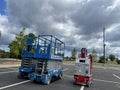 Scissor lift in a parking lot back view