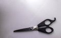 Scissors with black handles on a white background Royalty Free Stock Photo