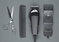 Scissors, Comb, Hair clipper. Professional barber hair clipper and shears for Man haircut. Hairdresser salon equipment. Royalty Free Stock Photo