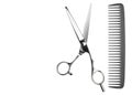 Scissors and comb. Professional barber scissors or shears, comb for man or woman haircut. Hairdresser salon equipment Royalty Free Stock Photo