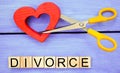 scissors cut heart. the inscription `divorce`. the concept of breaking relations, quarrels. treachery, betrayal. cancellation of m