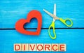 scissors cut heart. the inscription `divorce`. the concept of breaking relations, quarrels. treachery, betrayal. cancellation of m