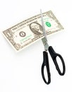 Scissors cuts one american dollar note Royalty Free Stock Photo