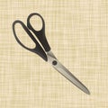 Scissors lie on the fabric. Royalty Free Stock Photo