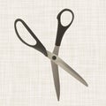 Scissors lie on textiles. Royalty Free Stock Photo