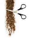 Scissors and lock of hair Royalty Free Stock Photo