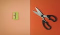 Scissors and pencil sharpener. red and pink background. flat layer Royalty Free Stock Photo