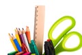 Scissors ruller and multicolored pencils isolated on white backg Royalty Free Stock Photo