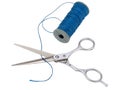 Scissors and a spool of blue thread on white background