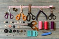 Scissors, thread, buttons and needles for sewing